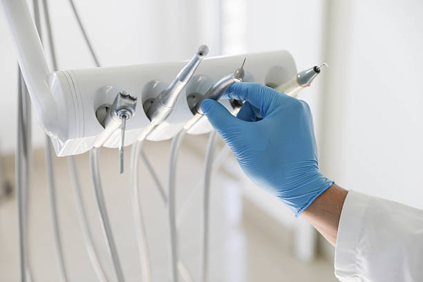 Professional Dental technician working in Village of the Branch, NY